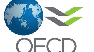 OECD, global büyüme tahminlerini düşürdü